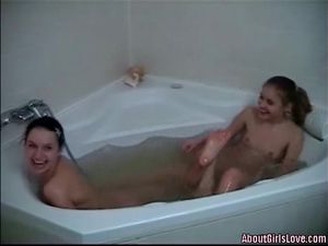 Babes Bathe Together To Make Out And Suck Tits